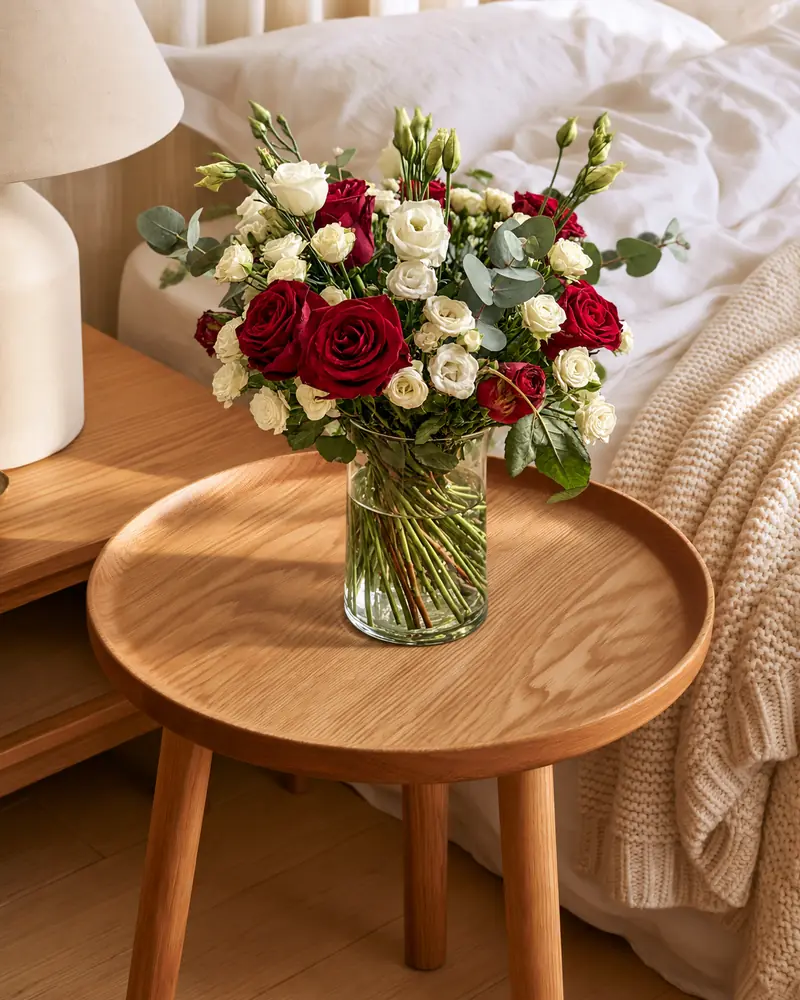 Example with sample flowers: a vase arrangement in the Bedside table · morning sun room, kept as made
